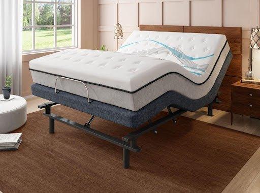 Adjustable power base bed with a white memory foam mattress in a modern bedroom