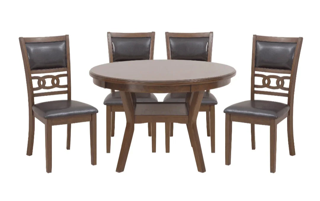 Round wooden dining table set with four dark brown leather chairs