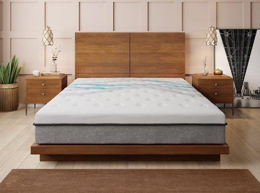 Modern wooden bed frame with a white mattress and matching nightstands in a bedroom
